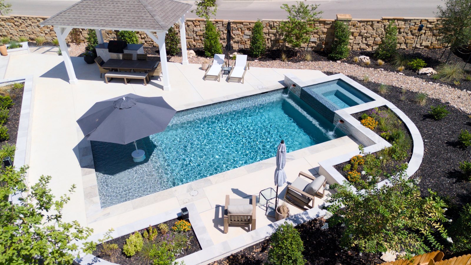 Aerial view of a custom freeform gunite pool built by J. Oliver Pools in Veramendi, New Braunfels