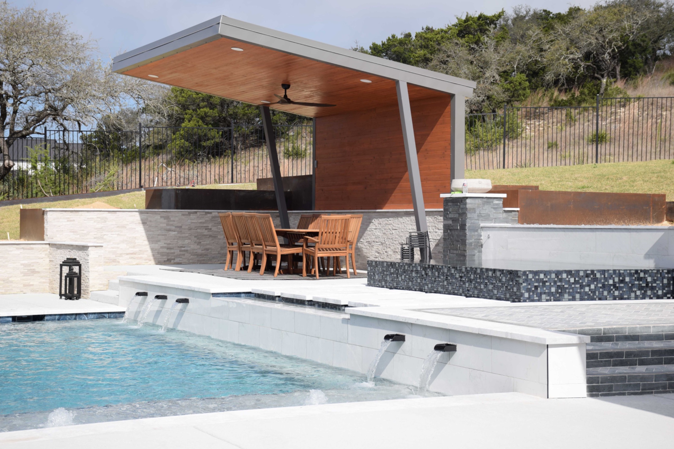 Custom pool and outdoor pavilion built by J. Oliver Pools near San Antonio, Texas