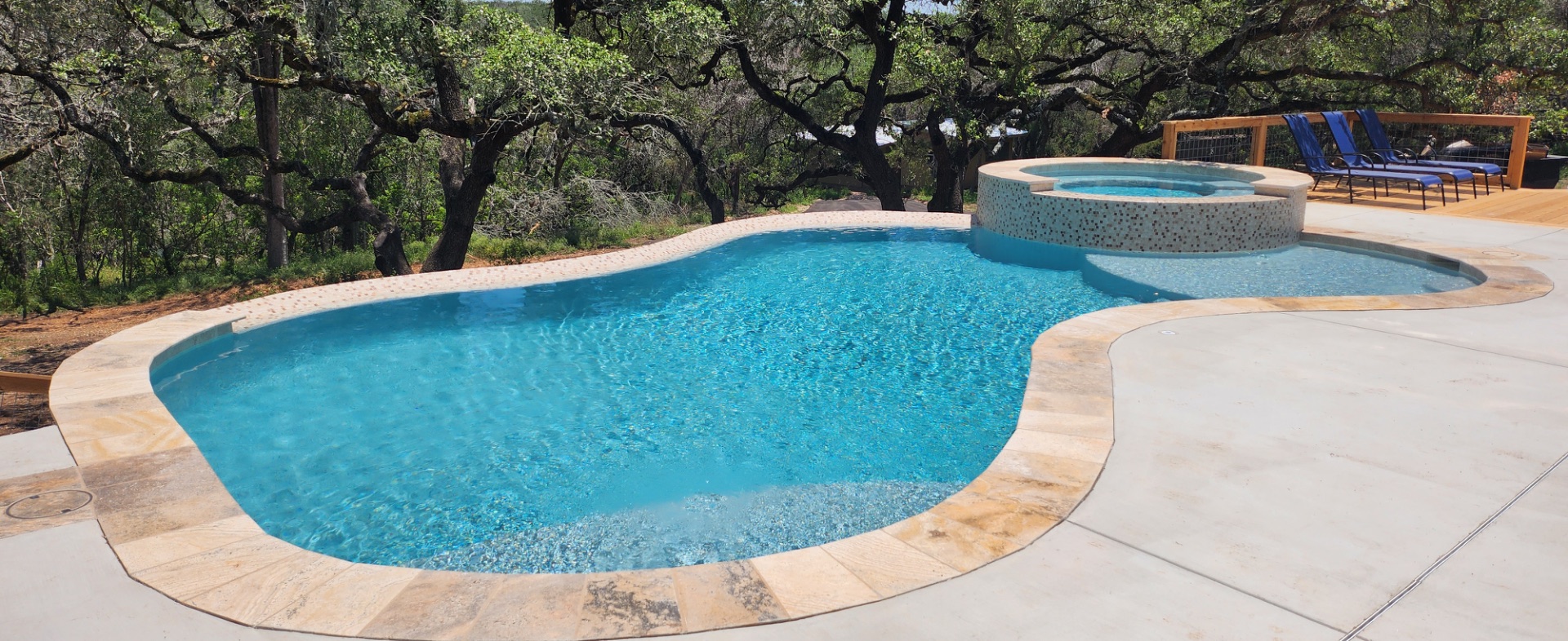 Custom gunite swimming pool under construction by J. Oliver Pools in New Braunfels, Texas
